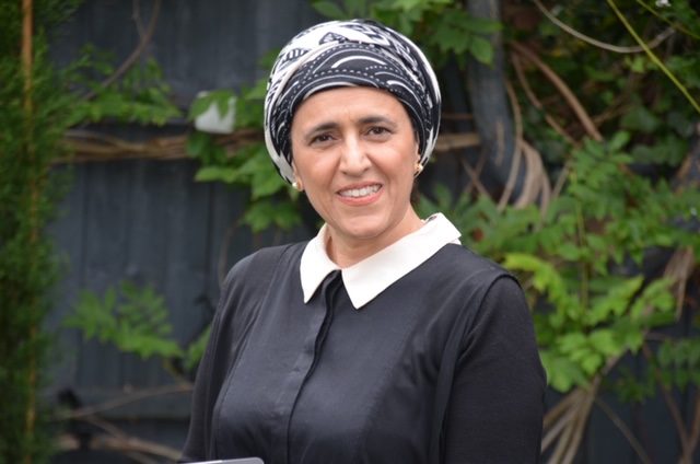 A person smiling for the camera